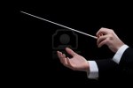 orchestra-conductor-hands-one-with-baton-black-background